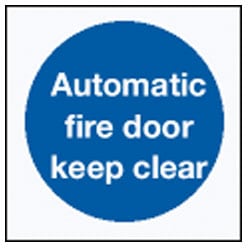 Automatic fire door keep clear sign