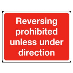 Reversing prohibited unless under direction Sign