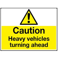 Caution - Heavy vehicles turning ahead Sign